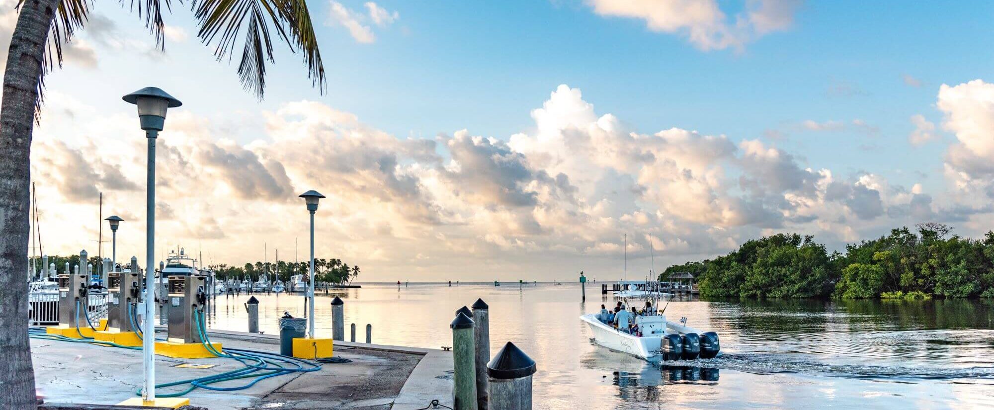 An insured boat leaving the harbor in Miami, FL